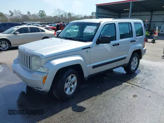 2011 Jeep Liberty Sport Jet with VIN 1J4PN2GK1BW566617, listed as a IAAI auction lot 41789607 with 225,536 mi miles. Bid and sale history available at carsss.com. Image 2.