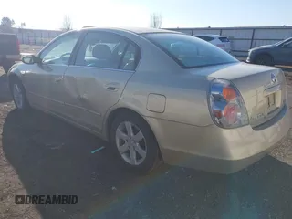 2002 Nissan Altima S with VIN 1N4AL11D52C125375, listed as a IAAI auction lot 41378101 with 148,701 mi miles. Bid and sale history available at carsss.com. Image 3.