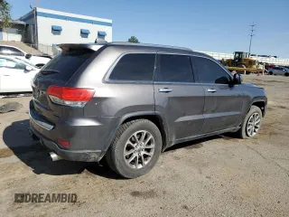 2014 Jeep Grand Cherokee Limited with VIN 1C4RJFBT6EC410774, listed as a Copart auction lot 58011005 with 166,506 mi miles and Salvage title. Bid and sale history available at DreamBid. Image 3.