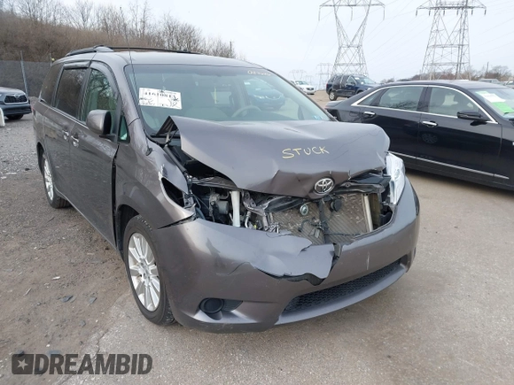 2014 Toyota Sienna LE with VIN 5TDJK3DC1ES087626, listed as a IAAI auction lot 41610813 with 142,311 mi miles and . Bid and sale history available at DreamBid. Image 6.