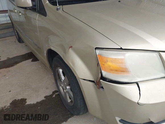 2010 Dodge Grand Caravan SXT with VIN 2D4RN5D17AR496854, listed as a IAAI auction lot 42210738 with 213,121 mi miles and . Bid and sale history available at DreamBid. Image 6.