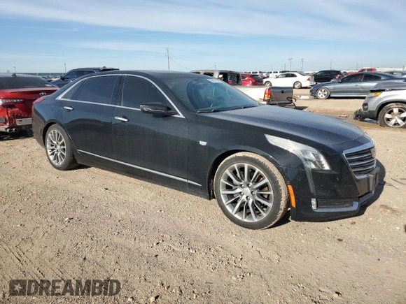 2016 Cadillac CT6 Luxury RWD z VIN 1G6KC5RX4GU156836, wystawiony jako Copart lot #54591185 z przebiegiem 122 418 mil mil oraz Szkody całkowita. Historia ofert i sprzedaży dostępna na DreamBid. Obrazek 4.