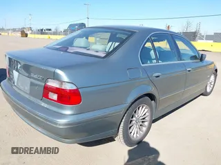 2002 BMW 5 Series 540iA with VIN WBADN63422GN87250, listed as a IAAI auction lot 41681974 with 182,007 mi miles. Bid and sale history available at carsss.com. Image 4.