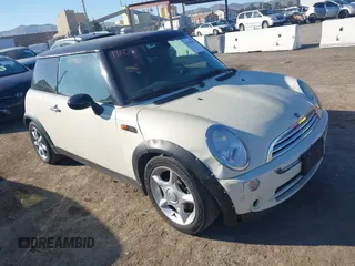 2006 MINI Hardtop with VIN WMWRC335X6TK18734, listed as a IAAI auction lot 41445656 with 143,428 mi miles and . Bid and sale history available at DreamBid. Image 1.