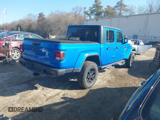 2021 Jeep Gladiator Willys with VIN 1C6HJTAG3ML572690, listed as a IAAI auction lot 41649907 with 74,734 mi miles and . Bid and sale history available at DreamBid. Image 4.