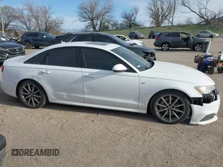 2017 Audi A6 Premium z VIN WAUF8AFC1HN100842, wystawiony jako IAAI lot #42024333 z przebiegiem 89 275 mil mil oraz . Historia ofert i sprzedaży dostępna na DreamBid. Obrazek 14.