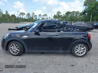 2021 MINI Convertible Cooper S z VIN WMWWJ5C0XM3M08622, wystawiony jako IAAI lot #42507679 z przebiegiem 36 932 mil mil oraz . Historia ofert i sprzedaży dostępna na DreamBid. Obrazek 14.