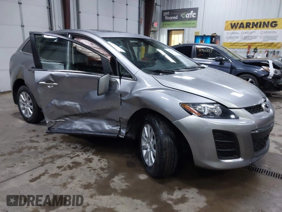 2011 Mazda CX-7 i Sport z VIN JM3ER2B53B0391249, wystawiony jako IAAI lot #41935241 z przebiegiem 190 163 mil mil oraz . Historia ofert i sprzedaży dostępna na DreamBid. Obrazek 1.
