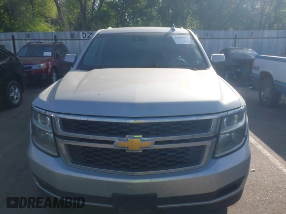 2016 Chevrolet Suburban LT z VIN 1GNSKHKC5GR281539, wystawiony jako IAAI lot #42500552 z przebiegiem 244 064 mil mil oraz . Historia ofert i sprzedaży dostępna na DreamBid. Obrazek 12.