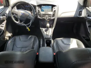 2016 Ford Focus Titanium with VIN 1FADP3N26GL202929, listed as a Copart auction lot 57466095 with 101,525 mi miles and Salvage title. Bid and sale history available at DreamBid. Image 8.