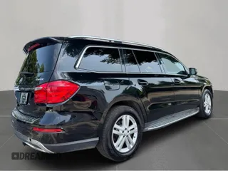 2014 Mercedes-Benz GL 450 with VIN 4JGDF7CEXEA391199, listed as a Copart auction lot 65090185 with 161,997 mi miles and Clean title. Bid and sale history available at DreamBid. Image 4.