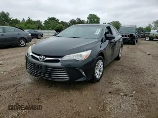 2017 Toyota Camry XLE z VIN 4T1BF1FK5HU780261, wystawiony jako Copart lot #57806555 z przebiegiem 216 536 mil mil oraz Szkoda całkowita • Salvage title. Historia ofert i sprzedaży dostępna na DreamBid. Obrazek 13.