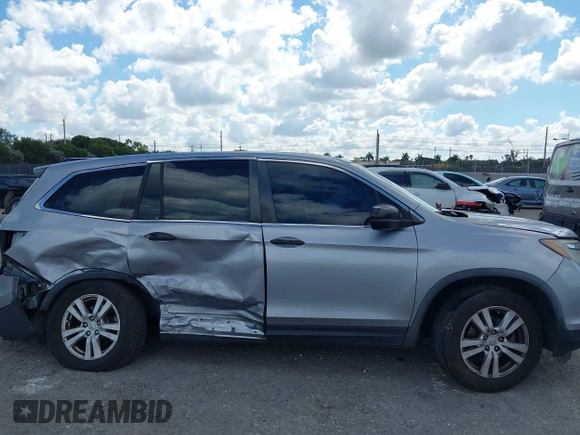 2016 Honda Pilot LX with VIN 5FNYF6H1XGB099987, listed as a IAAI auction lot 41556979 with 98,373 mi miles. Bid and sale history available at carsss.com. Image 13.