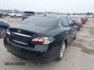 2011 Infiniti M with VIN JN1BY1AP4BM320231, listed as a IAAI auction lot 41446113 with 124,330 mi miles. Bid and sale history available at carsss.com. Image 4.