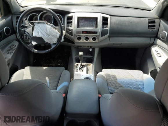 2011 Toyota Tacoma with VIN 3TMLU4EN6BM070132, listed as a Copart auction lot 56536564 with 185,256 mi miles and Salvage Title. Bid and sale history available at DreamBid. Image 8.