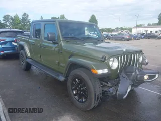 2023 Jeep Gladiator High Altitude with VIN 1C6HJTFG0PL561000, listed as a IAAI auction lot 42200007 with 34,600 mi miles and . Bid and sale history available at DreamBid. Image 1.