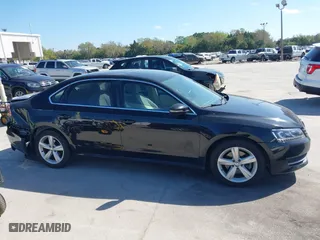 2012 Volkswagen Passat SE w/Sunroof with VIN 1VWBH7A38CC063186, listed as a IAAI auction lot 41700992 with 151,454 mi miles. Bid and sale history available at carsss.com. Image 13.