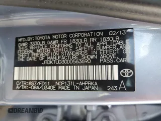 2013 Toyota Yaris L with VIN JTDKTUD30DD563690, listed as a Copart auction lot 50710715 with 98,331 mi miles and Salvage Title. Bid and sale history available at DreamBid. Image 13.
