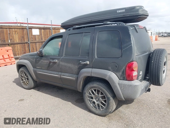 2002 Jeep Liberty Sport with VIN 1J4GL48K02W313000, listed as a IAAI auction lot 41837671 with 168,362 mi miles. Bid and sale history available at carsss.com. Image 3.