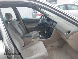 1997 Honda Accord Value with VIN 1HGCD568XVA184006, listed as a IAAI auction lot 41818518 with 276,230 mi miles and . Bid and sale history available at carsss.com. Image 5.