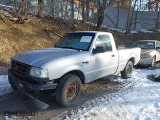 2003 Ford Ranger XL with VIN 1FTYR10D13PA59085, listed as a IAAI auction lot 41589601 with 187,160 mi miles. Bid and sale history available at carsss.com. Image 2.