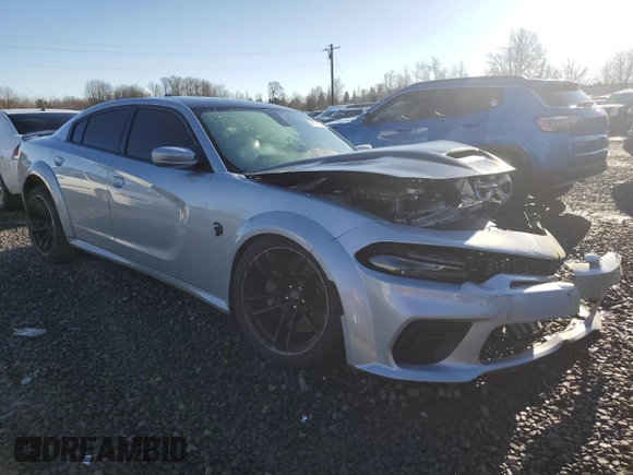 2022 Dodge Charger SRT Hellcat Widebody z VIN 2C3CDXL98NH159571, wystawiony jako Copart lot #87457204 z przebiegiem 15 828 mil mil oraz Szkoda całkowita • Salvage title. Historia ofert i sprzedaży dostępna na DreamBid. Obrazek 4.
