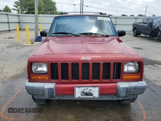 1999 Jeep Cherokee Sport with VIN 1J4FT68SXXL669549, listed as a Copart auction lot 62367015 with 194,446 mi miles and Salvage title. Bid and sale history available at DreamBid. Image 5.