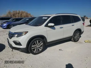 2017 Honda Pilot Touring with VIN 5FNYF6H90HB089380, listed as a Copart auction lot 77048374 with 0 mi miles and Clean Title. Bid and sale history available at carsss.com. Image 1.