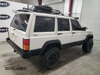 1996 Jeep Cherokee Sport with VIN 1J4FJ68S5TL235927, listed as a Copart auction lot 68942174 with 238,619 mi miles and Clean Title. Bid and sale history available at carsss.com. Image 3.