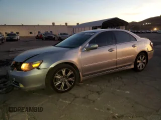 2009 Acura RL Tech Pkg with VIN JH4KB266X9C002410, listed as a Copart auction lot 85615504 with 192,840 mi miles and Salvage Title. Bid and sale history available at carsss.com. Image 1.