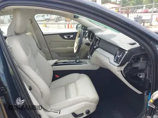 2024 Volvo S60 Plus Dark Theme с VIN 7JRL12FL9RG294057, выставлен на аукционе IAAI как лот 42231808 с пробегом 10 415 миль миль и . История ставок и продаж доступна на DreamBid. Изображение 5.