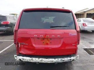 2014 Dodge Grand Caravan SXT with VIN 2C4RDGCG3ER257695, listed as a IAAI auction lot 41534568 with 116,896 mi miles and . Bid and sale history available at DreamBid. Image 17.