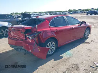 2024 Toyota Camry LE z VIN 4T1C11AK1RU207305, wystawiony jako IAAI lot #41973066 z przebiegiem 19 165 mil mil oraz . Historia ofert i sprzedaży dostępna na DreamBid. Obrazek 4.