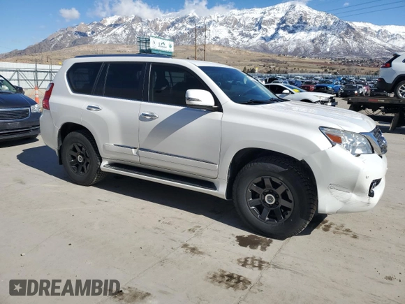 2012 Lexus GX 460 Premium with VIN JTJJM7FX4C5042312, listed as a Copart auction lot 47000615 with 242,046 mi miles and Salvage title. Bid and sale history available at DreamBid. Image 4.