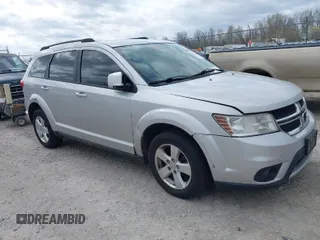 2012 Dodge Journey SXT z VIN 3C4PDDBG2CT249377, wystawiony jako IAAI lot #41948616 z przebiegiem 220 033 mil mil oraz . Historia ofert i sprzedaży dostępna na DreamBid. Obrazek 1.