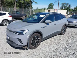 2021 Volkswagen ID.4 Pro S z VIN WVGTMPE20MP058882, wystawiony jako IAAI lot #42317440 z przebiegiem 64 473 mil mil oraz . Historia ofert i sprzedaży dostępna na DreamBid. Obrazek 20.