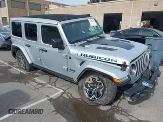 2023 Jeep Wrangler Rubicon with VIN 1C4JJXR69PW581474, listed as a IAAI auction lot 41697016 with 25,775 mi miles and . Bid and sale history available at DreamBid. Image 1.