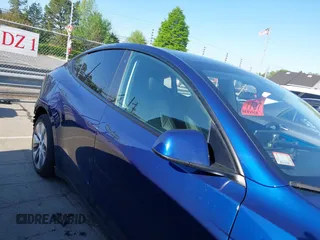 2023 Tesla Model Y Long Range with VIN 7SAYGDEE0PF762592, listed as a IAAI auction lot 41983933 with 28,510 mi miles and . Bid and sale history available at carsss.com. Image 13.