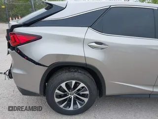 2022 Lexus RX 350 with VIN 2T2AZMDA7NC352957, listed as a IAAI auction lot 42297457 with 34,576 mi miles and . Bid and sale history available at DreamBid. Image 17.