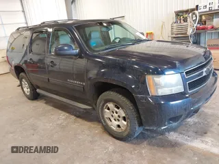 2009 Chevrolet Suburban LT w/1LT with VIN 1GNFK26319R272557, listed as a IAAI auction lot 42138238 with 223,599 mi miles. Bid and sale history available at carsss.com. Image 1.