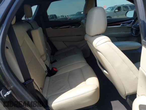 2019 Cadillac XT5 Luxury AWD z VIN 1GYKNDRS9KZ235687, wystawiony jako IAAI lot #41987360 z przebiegiem 78 784 mil mil oraz . Historia ofert i sprzedaży dostępna na DreamBid. Obrazek 8.