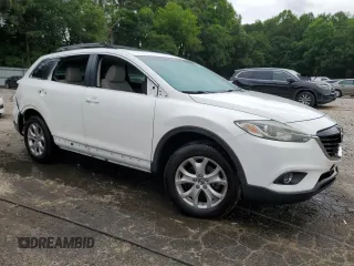 2015 Mazda CX-9 Touring with VIN JM3TB2CA9F0463715, listed as a Copart auction lot 59764565 with 113,535 mi miles and Salvage title. Bid and sale history available at DreamBid. Image 4.
