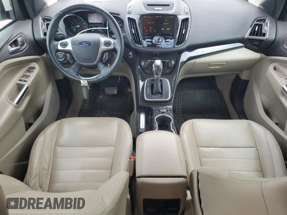 2014 Ford Escape Titanium с VIN 1FMCU0J97EUB15513, выставлен на аукционе Copart как лот 57391715 с пробегом 125 851 миль миль и Списание • Salvage title. История ставок и продаж доступна на DreamBid. Изображение 8.