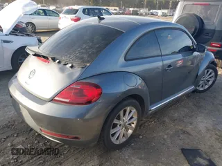 2017 Volkswagen Beetle 1.8T SE with VIN 3VWJ17AT5HM615698, listed as a IAAI auction lot 41099515 with 26,111 mi miles. Bid and sale history available at carsss.com. Image 4.