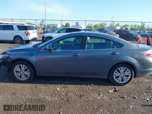 2009 Mazda 6 i Touring with VIN 1YVHP82A895M28041, listed as a IAAI auction lot 42151899 with 91,929 mi miles and . Bid and sale history available at carsss.com. Image 14.