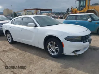 2021 Dodge Charger SXT with VIN 2C3CDXBG9MH632361, listed as a IAAI auction lot 41461030 with 58,923 mi miles. Bid and sale history available at carsss.com. Image 1.