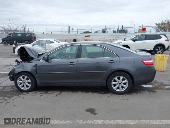 2007 Toyota Camry LE with VIN JTNBK46K873015787, listed as a IAAI auction lot 42071849 with 61,661 mi miles and . Bid and sale history available at DreamBid. Image 14.