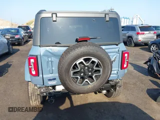 2024 Ford Bronco Outer Banks z VIN 1FMDE8BH3RLB41205, wystawiony jako IAAI lot #42558633 z przebiegiem 1 457 mil mil oraz . Historia ofert i sprzedaży dostępna na DreamBid. Obrazek 16.
