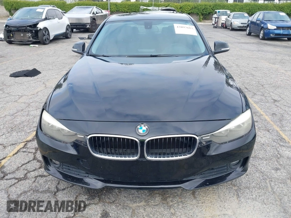 2014 BMW 3 Series 320i with VIN WBA3B1G57ENS80800, listed as a IAAI auction lot 42097683 with 152,924 mi miles. Bid and sale history available at carsss.com. Image 12.