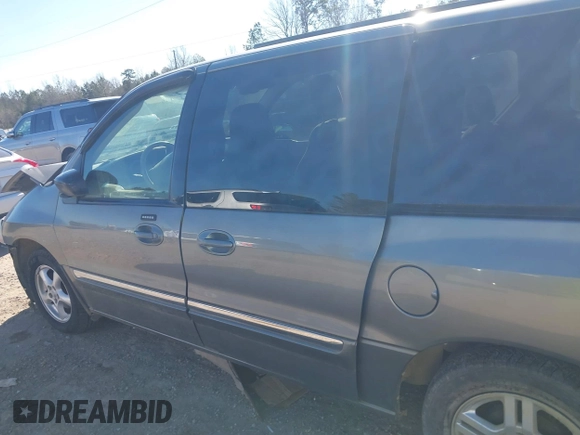 2003 Ford Windstar SE with VIN 2FMZA52473BB65706, listed as a IAAI auction lot 41300897 with 160,965 mi miles and . Bid and sale history available at DreamBid. Image 17.